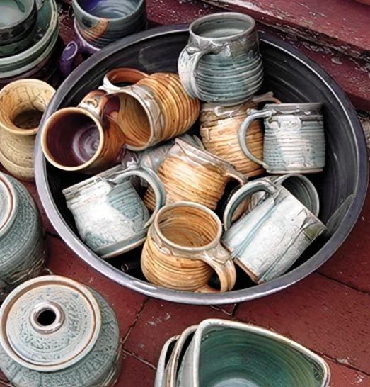 A bowl full of cups