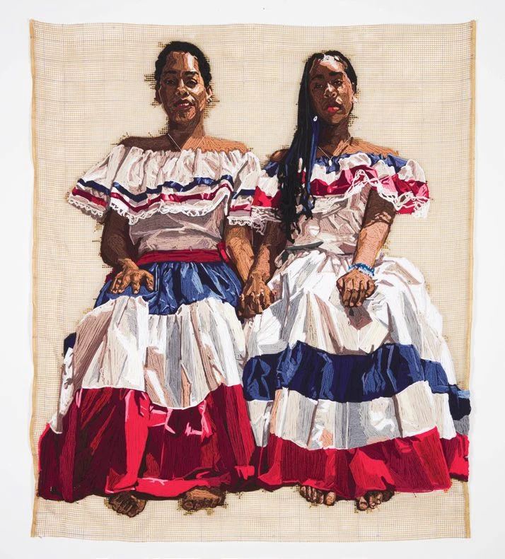 A painting of two women in colorful dresses