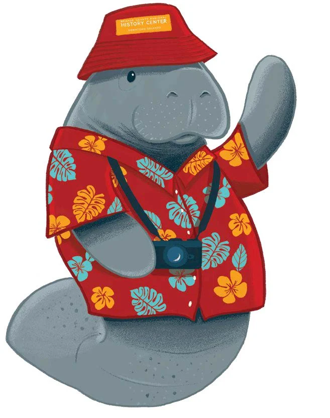 Hugh the manatee. A cartoon manatee in a colorful Hawaiian shirt.