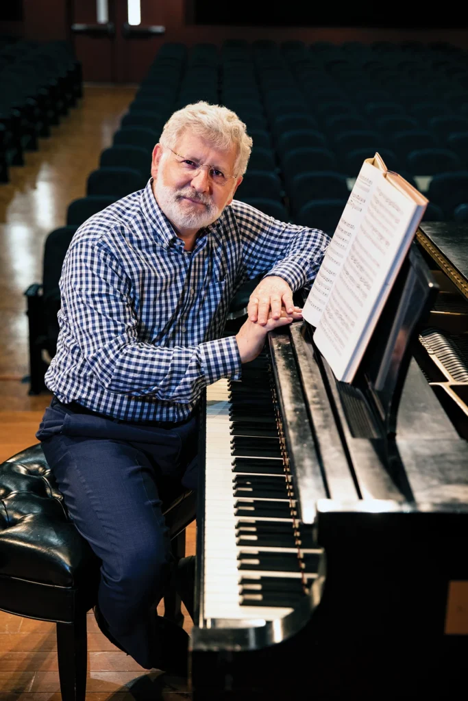 John Sinclair at a piano