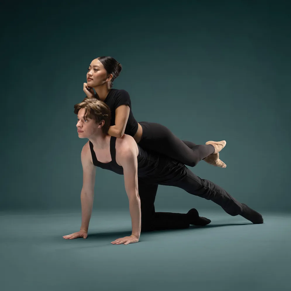 Two dancers strike a pose together