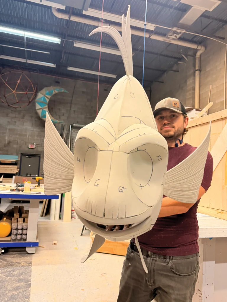 An unpainted puppet of a fish