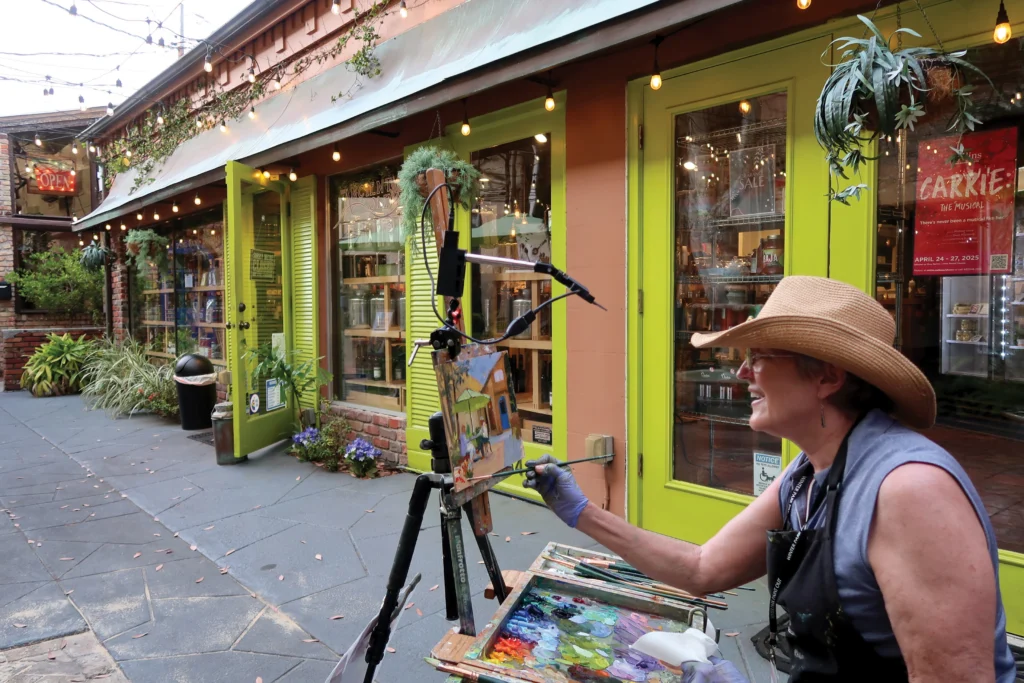 An artist working on a painting