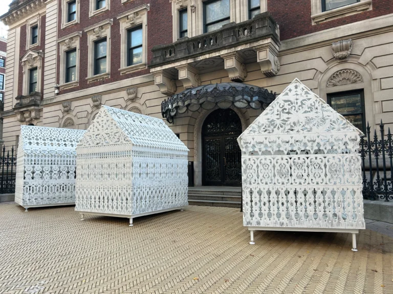 three small structures inspired by the shapes of 18th-century houses