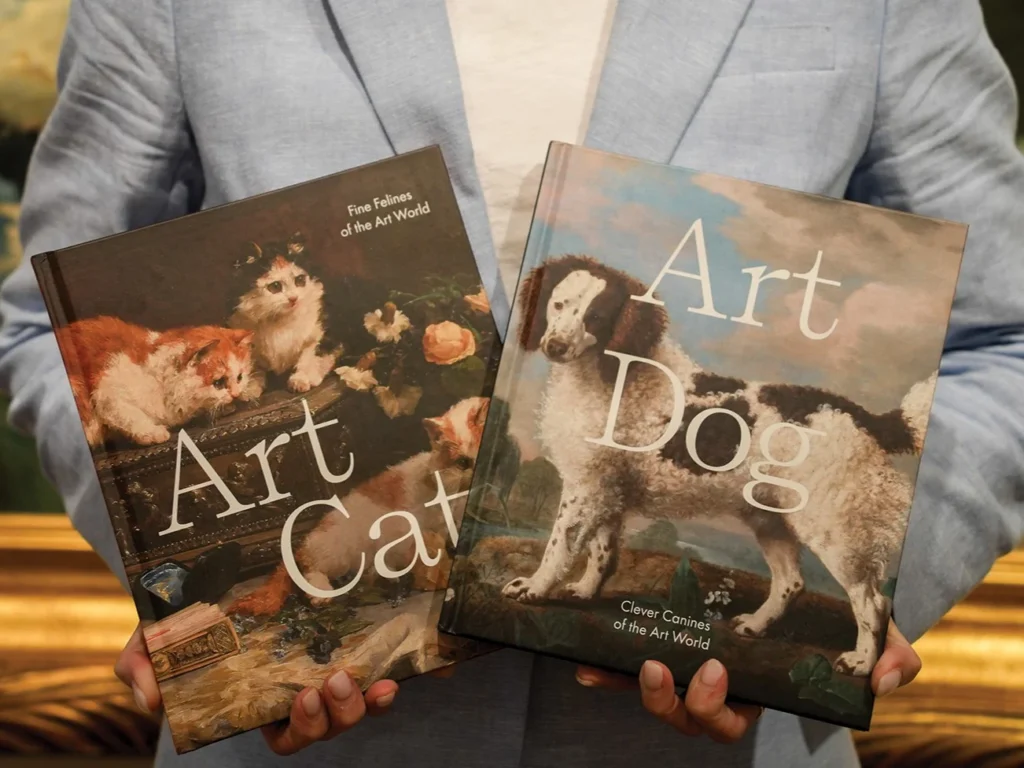 Art Cat and Art Dog books held side by side
